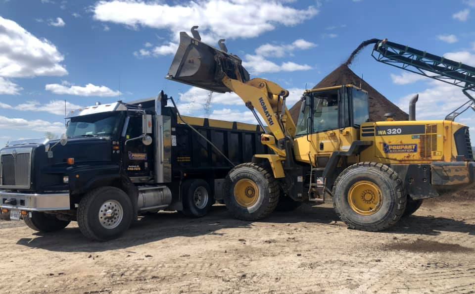 Dump truck and a loader working at Poupart Excavation